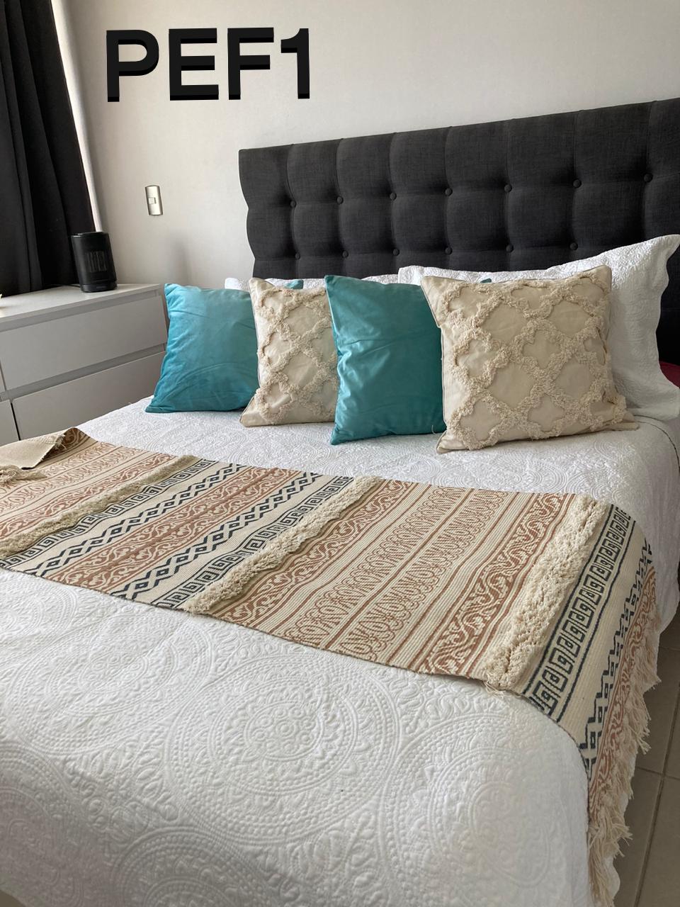 Kilim bordadas con flecos