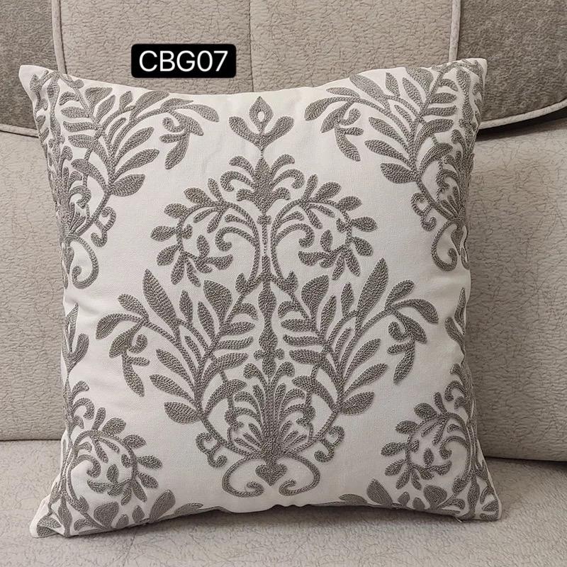 Fundas bordadas de cojines en gris