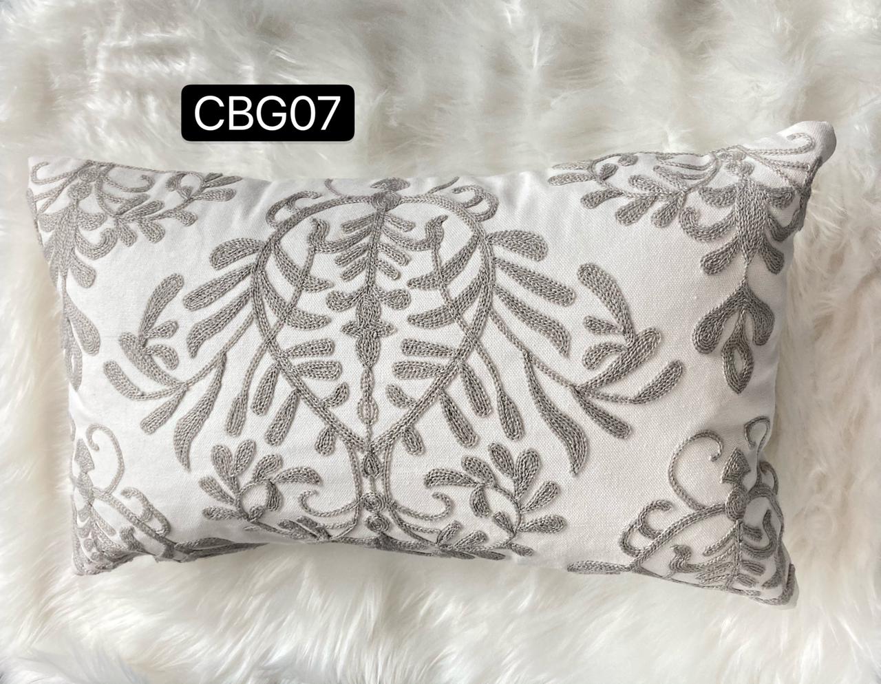 Fundas bordadas de cojines en gris