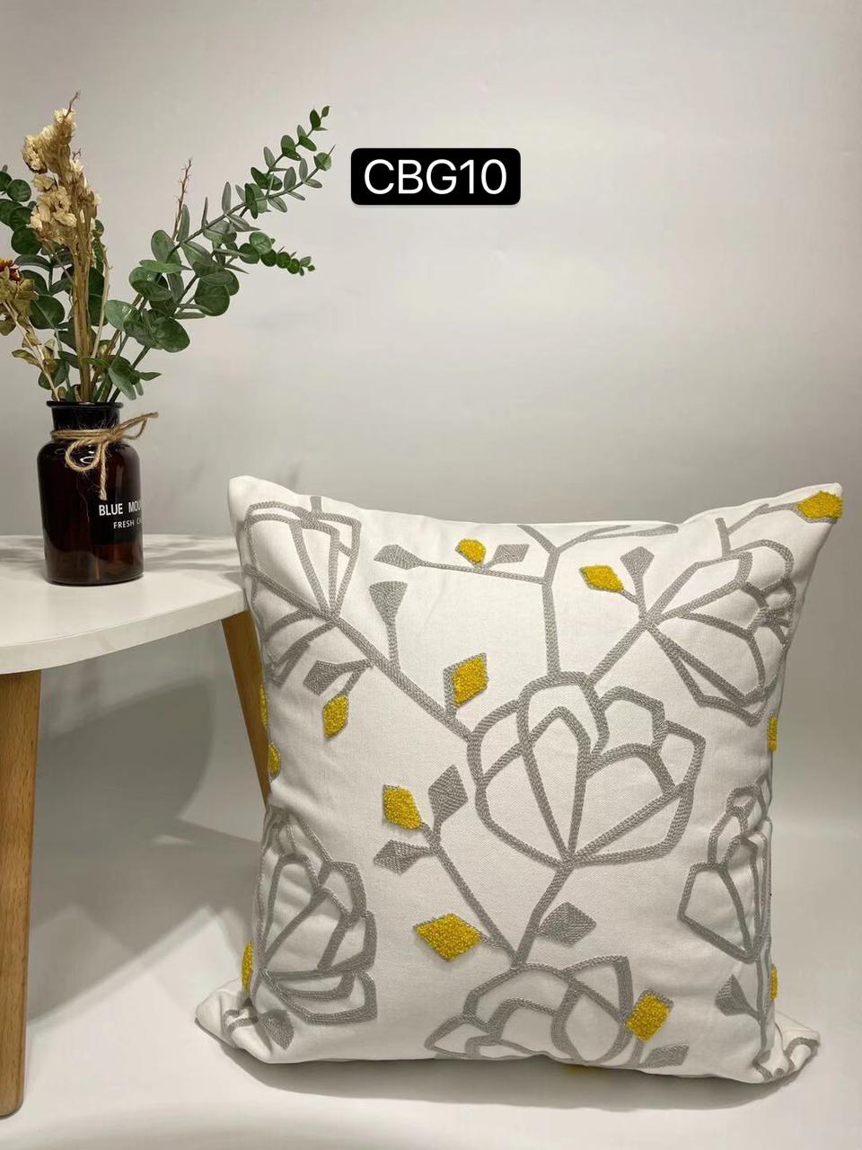 Fundas bordadas de cojines en gris