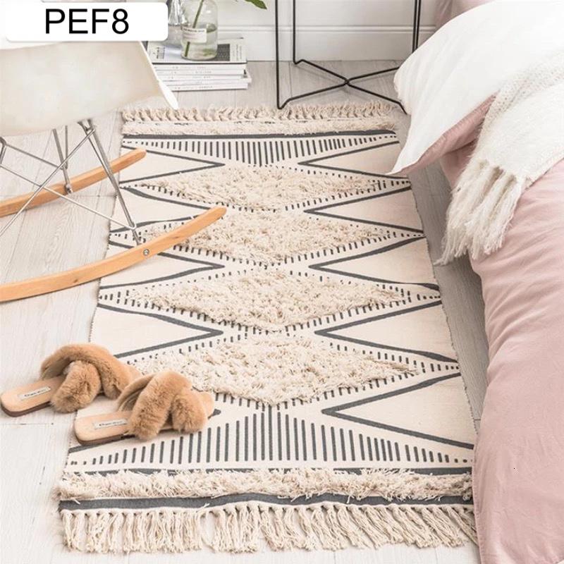 Kilim bordadas con flecos