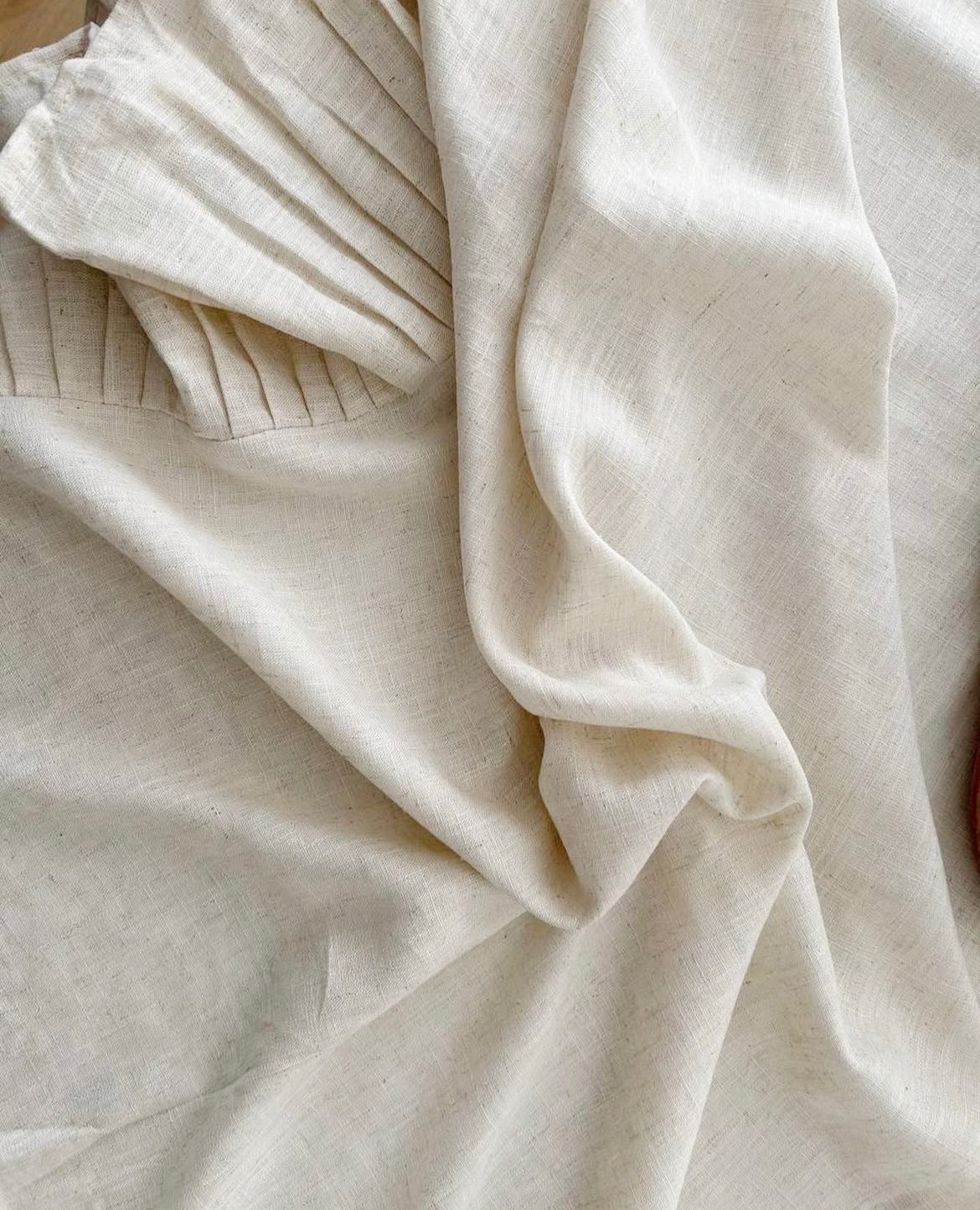 Mantel elegante,  de lino beige