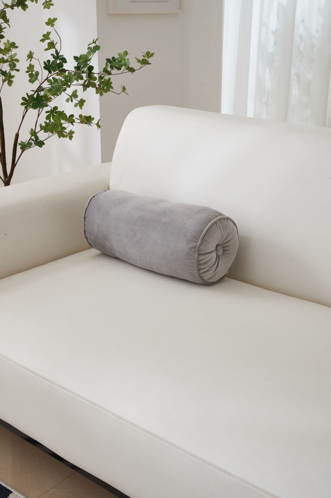 Cojín cilíndrico  44cm de largo  y 20 de diámetro