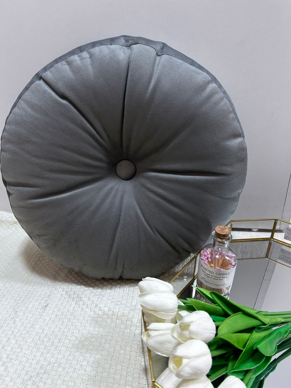 Cojin redondo velvet  con boton