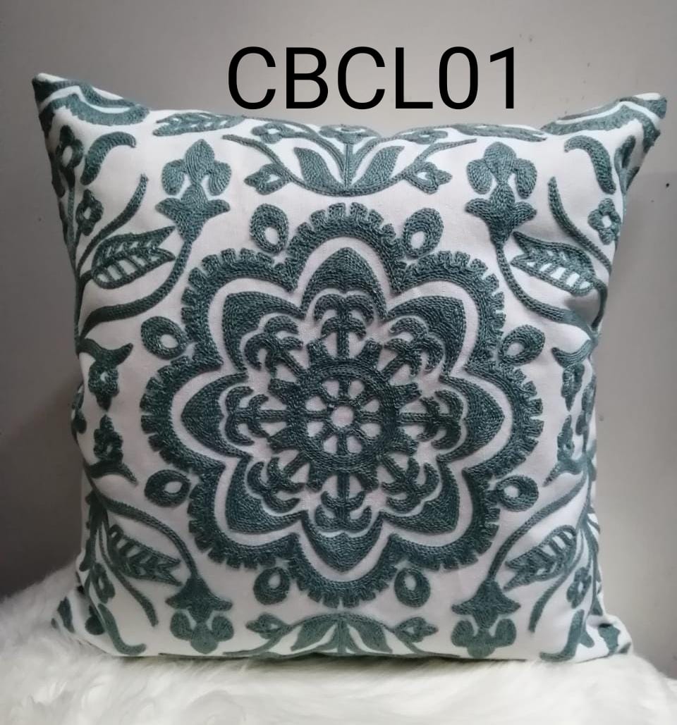 Fundas cojines bordados color turquesa