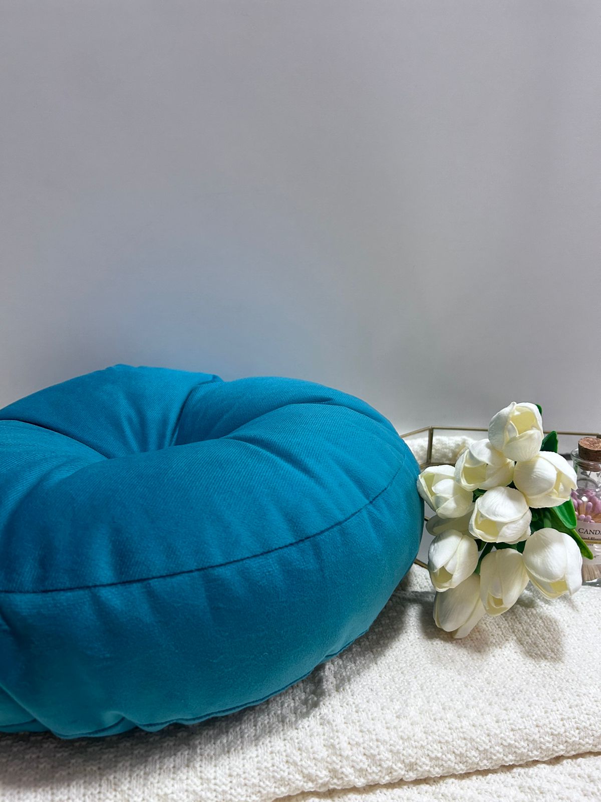 Cojin redondo velvet  con boton