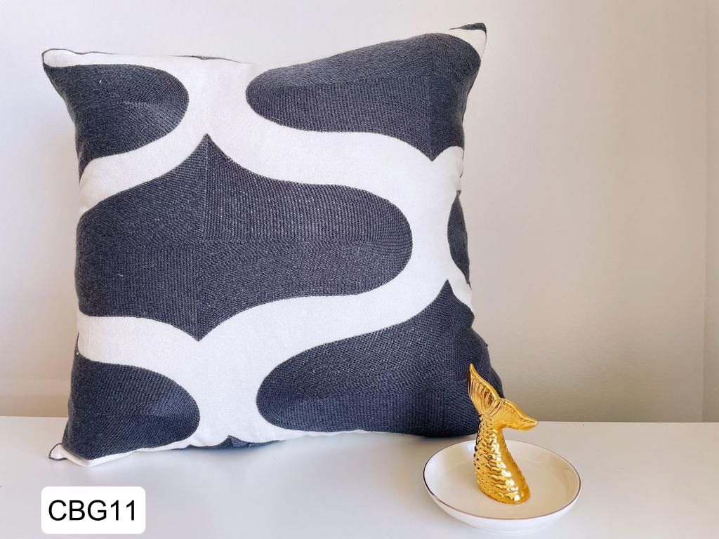 Fundas bordadas de cojines en gris