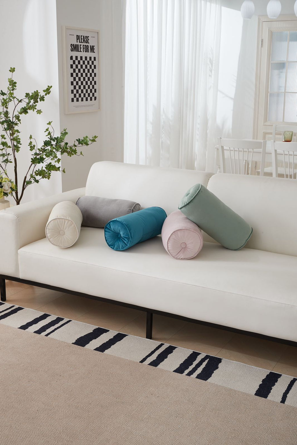 Cojín cilíndrico  44cm de largo  y 20 de diámetro