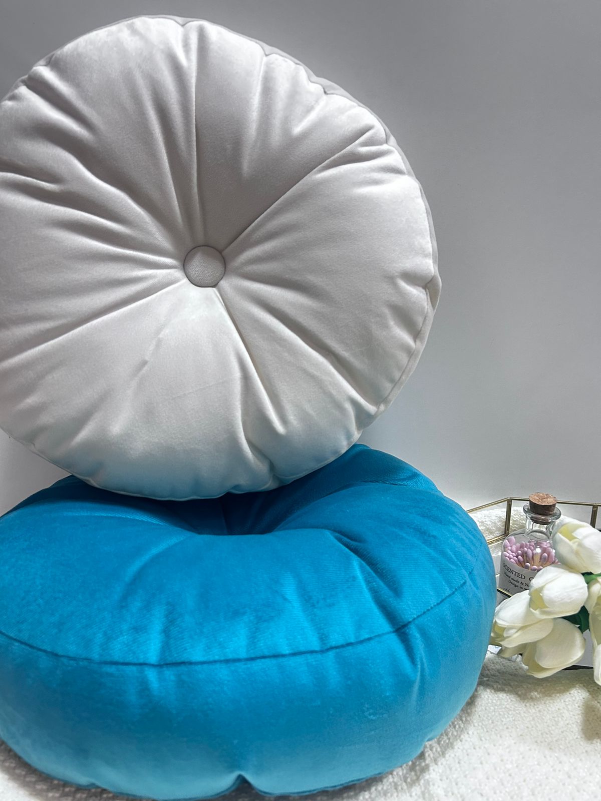 Cojin redondo velvet  con boton