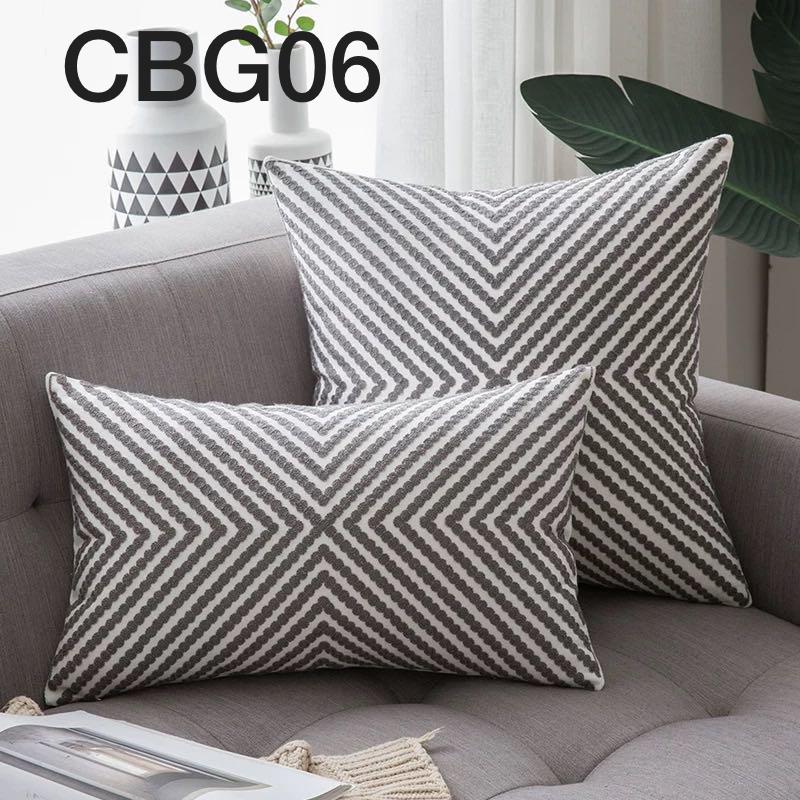 Fundas bordadas de cojines en gris
