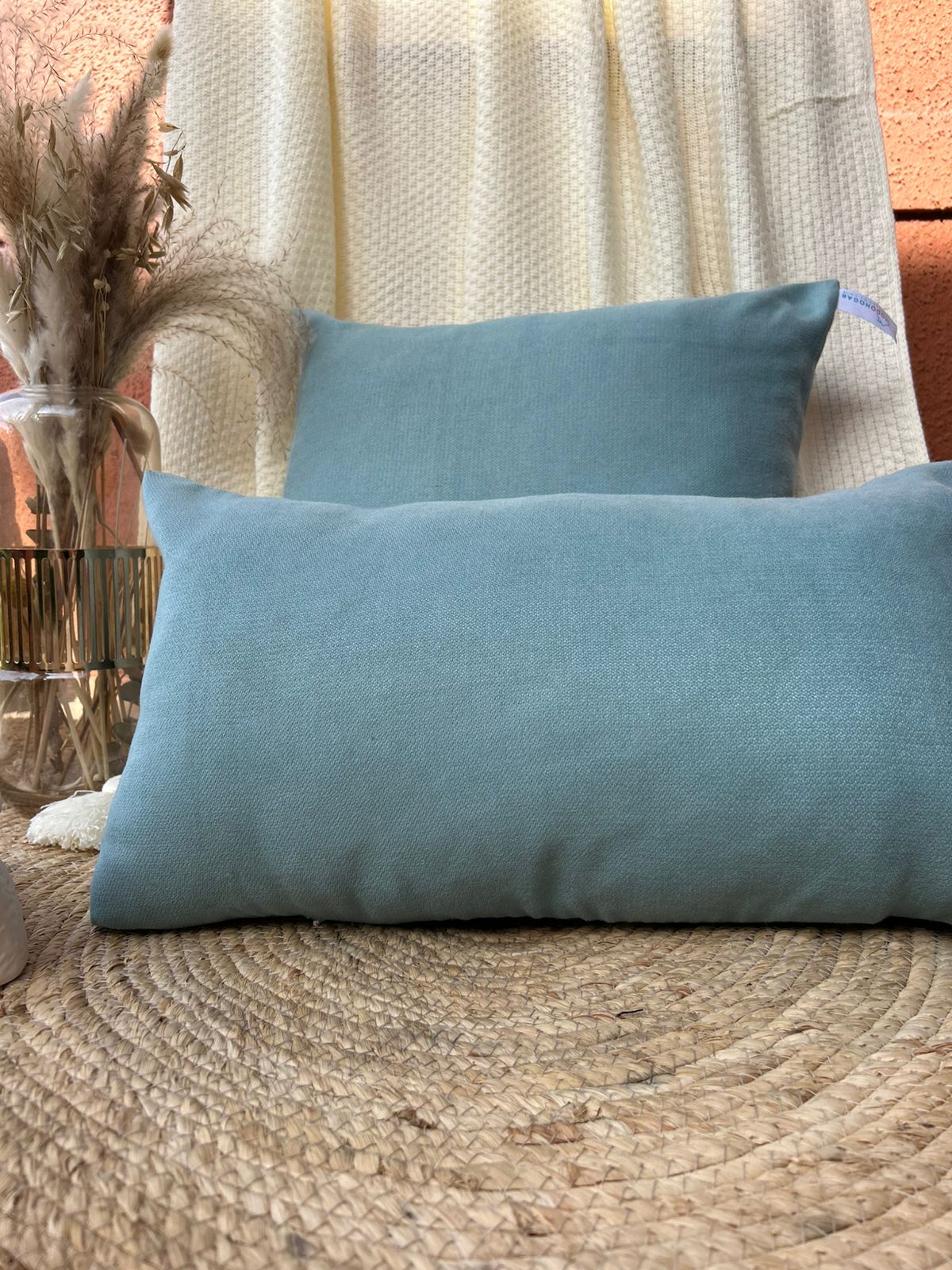 Fundas de cojines un tono celeste