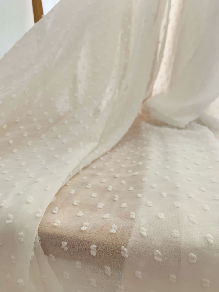 Visillo beige con borlas