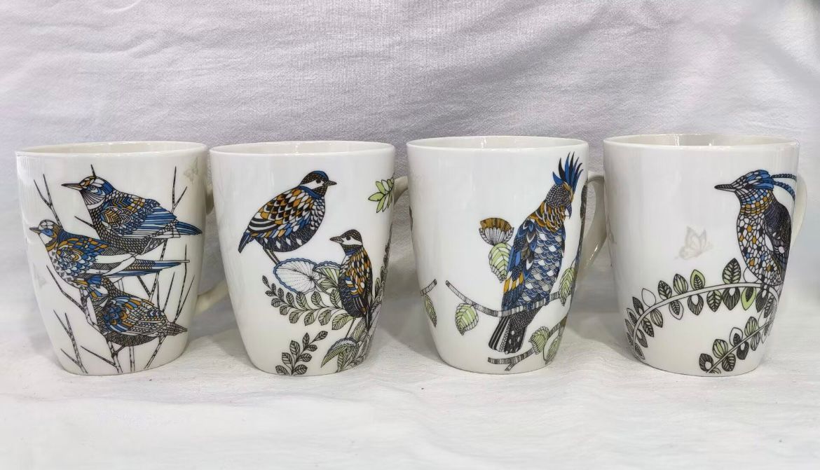 set de  4 tazas con diseños